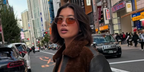 Digital creator Stephanie Hui was seen wearing gold Prada PR C51S 5AK70G sunglasses in Tokyo, shared through her Instagram post in November 2025.