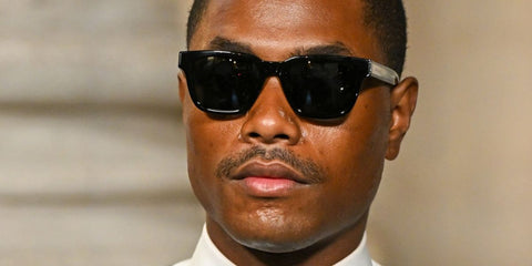 Musician Steve Lacy was seen wearing black Saint Laurent Sun SL 790 001 sunglasses at the Saint Laurent Menswear Fall/Winter 2025 fashion show during Paris Men's Fashion Week. Shop online now on Pretavoir
