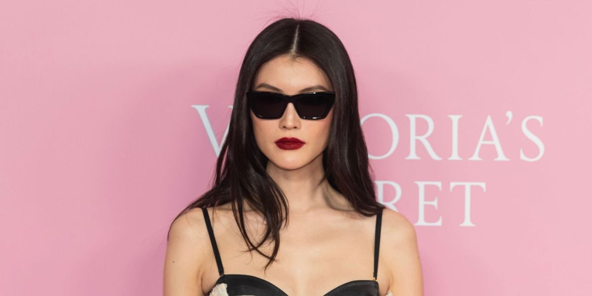 Sui He was seen wearing black Saint Laurent Sun SL 276 Mica 001 cat eye sunglasses to attend the Victoria's Secret's celebration of The Tour 2023 in New York City