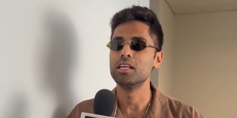 Indian cricketer and captain of India National Cricket Team Suryakumar Yadav was seen wearing gold Miu Miu MU A54S 26C09Z oval rimless sunglasses with dark brown lenses