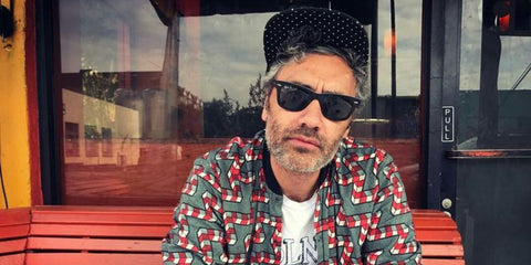 Taika Waititi is seen wearing Ray-Ban Wayfarer 2140 901/58 Polarised sunglasses in a social media post