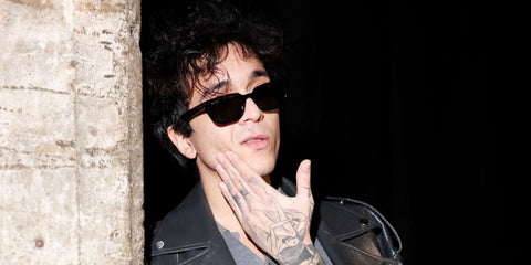 Italian singer Tananai was seen wearing black Gucci GG1539S 001 sunglasses at the Gucci Menswear Fall/Winter 2024 fashion show during Milan Men's Fashion Week.