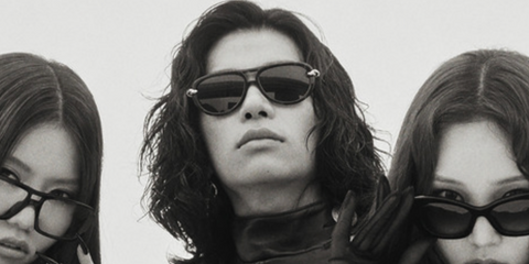 South Korean rapper Tarzzan of AllDay Project was seen wearing black Bottega Veneta BV1418S 005 Knot sunglasses in a Vogue Korea feature, July 2025.