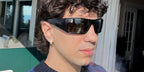 Italian singing sensation Tedua is seen wearing Oakley Heliostat OO9231 02 Prizm Polarised sunglasses in his Instagram post