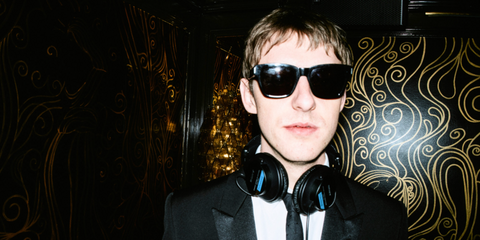 The Dare was seen wearing black Saint Laurent Sun SL 560 001 square sunglasses at the opening of Saint Laurent Meatpacking District boutique, December 2024