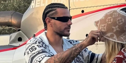 French footballer Theo Hernandez was seenw earing black Prada PR A19S 1AB5S0 wraparound sunglasses in his Instagram post, September 2025. Shop online now on Pretavoir