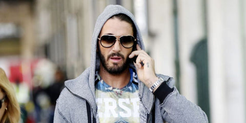 French television personality Thomas Vergara was seen wearing black and gold Dita Mach Two DRX 2031B 60 sunglasses with brown gradient lenses