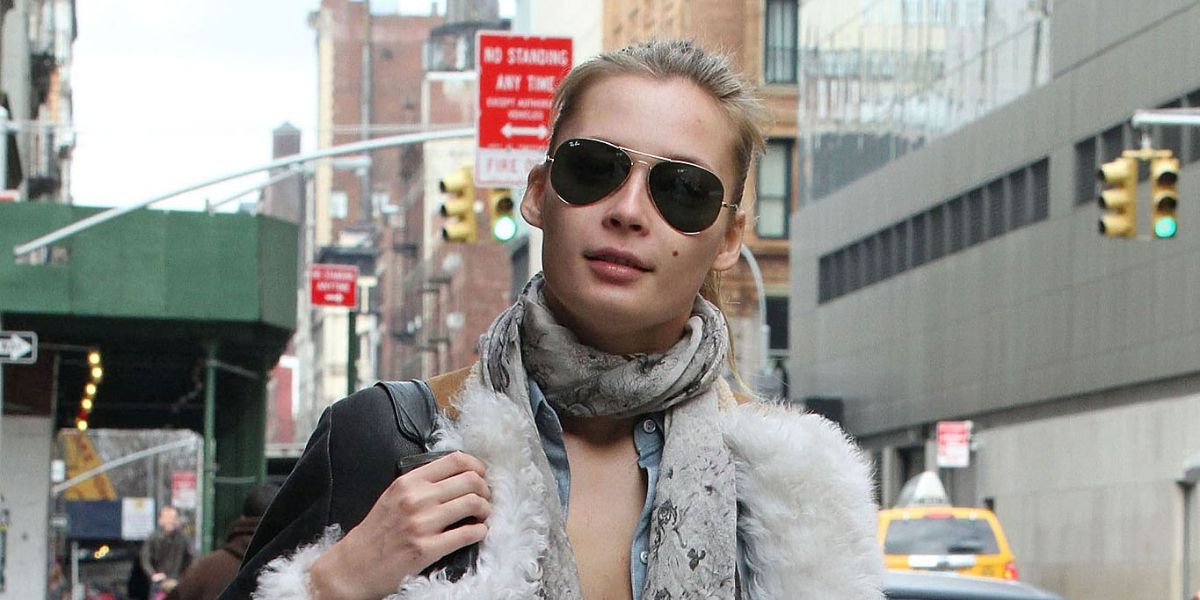 Estonian model Tiiu Kuik was seen wearing gold Ray-Ban Aviator II RB 3026 L2846 sunglasses in New York City