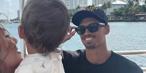Dutch footballer Tijjani Reijnders of Manchester Ct=ity was seen wearing black Ray-Ban Meta Wayfarer Gen 2 RW4012 601/71 Smart Glasses during his family trip to Miami, shared through his Instagram post in July 2025.