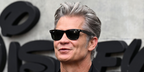 Actor Timothy Olyphant was seen wearing tortoiseshell Ray-Ban Wayfarer RB 2140 1382/R5 sunglasses with grey lenses at the European premiere of "Alien: Earth" in London, July 2025.