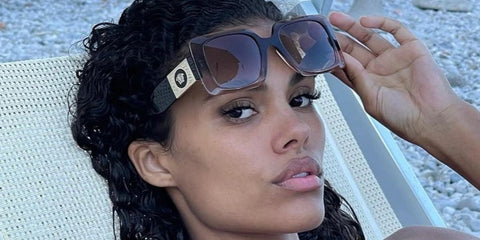 Tina Kunakey was seen wearing brown gradient Versace 4405 5332/13 sunglasses in a social media post