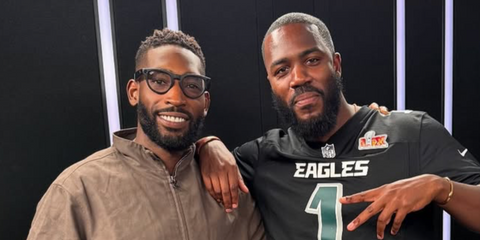 Tinie Tempah, pictured with comedian Mo Gilligan, was seen wearing matte black Ray-Ban Meta Headliner RW4009 601S/1Z Photochromic Smart Glasses in his Instagram post, July 2025. Shop online now on Pretavoir