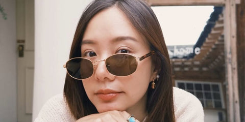 Thai actress Toey Jarinporn was seen wearing gold and tortoiseshell Prada PR B53S 5AK09Z oval sunglasses in a social media post. Shop online now on Pretavoir