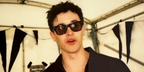 Tom Blyth was seen wearing Oliver Peoples N.04 OV5552U 1771 at the Wilderness Festival 2024