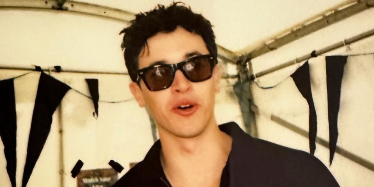 Tom Blyth was seen wearing Oliver Peoples N.04 OV5552U 1771 at the Wilderness Festival 2024