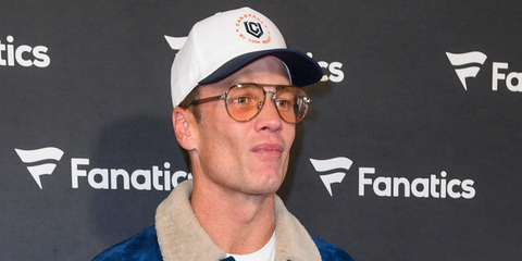Tom Brady was seen wearing transparent brown Tom Ford TF5981-B 045 Blue Control optical glasses at the Fanatics Super Bowl LX party in San Francisco, February 2026.