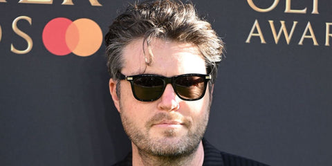 Tom Burke was seen wearing black Cartier CT0396S 001 sunglasses at The Olivier Awards 2025 in London.