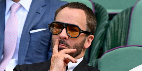 Fashion designer Tom Ford was seen wearing black Tom Ford Icon Collection TF1225 01E sunglasses with yellow lenses at the Wimbledon Tennis Championships 2026.