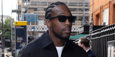 Actor Tosin Cole was seen wearing black Gucci GG1524S 001 sunglasses at the Claridge's London for a private dinner hosted by Gucci in June 2025.