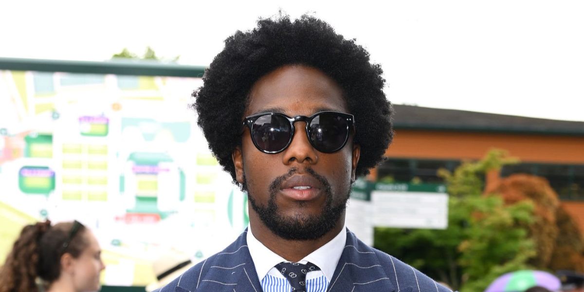 Actor Tosin Cole was seen wearing black Polo Ralph Lauren PH4110 5284/87 round sunglasses at the Wimbledon Tennis Championship 2025.