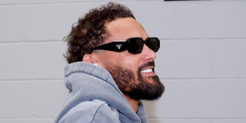 Basketball player Trae Young of the Washington Wizards was seen wearing black Prada PR 17WS 1AB5S0 Symbole Sunglasses ahead of an NBA game against the Atlanta Hawks in February 2026.