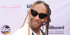 Ty Dolla $ign was seen wearing black Saint Laurent Sun SL 181 LouLou 001 heart-shaped sunglasses at the Billboard Music Awards 2017.