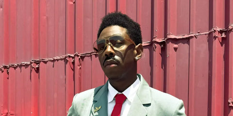 Tyler, the Creator was seen wearing Bottega Veneta BV1305S 002 "Sardine" aviator sunglasses in a GQ Magazine feature. Shop online now on Pretavoir