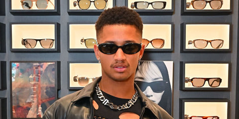 Digital creator Tyreece Nye was seen wearing black Ray-Ban RB 4441D 6677/87 sunglasses at a Sunglasses Hut event in London, June 2025.
