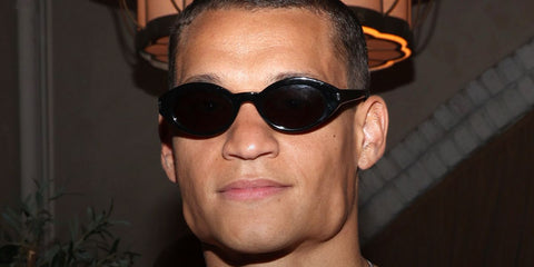 Actor Tyriq Withers was seen wearing black Saint Laurent Sun SL 567 001 sunglasses