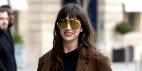 Spanish actress Ursula Corbero was seen wearing gold Loewe Signature LW40180U 30F sunglasses during Paris Fashion Week season Fall/Winter 2025. Shop online now on Pretavoir