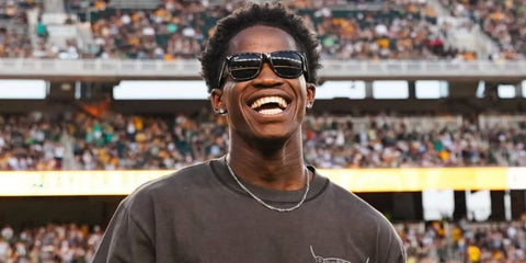 Basketball player V.J. Edgecombe was seen wearing black Ray-Ban Justin 4165 601/71 sunglasses in Waco, September 2025. Shop online now on Pretavoir