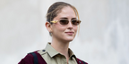 Italian influencer and entrepreneur Valentina Ferragni was seen wearing gold Prada PR D51S 5AK20I sunglasses at the Prada Fall/Winter 2026 fashion show during Milan Fashion Week.