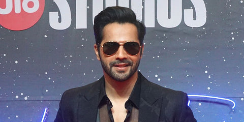 Bollywood actor Varun Dhawan was seen wearing gold Ray-Ban New Aviator RB 3625 9196/31 sunglasses at the Jio Studio announcement of upcoming films and web series in Mumbai, India, April 2023