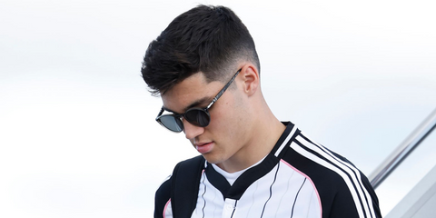 Montenegrin footballer Vasilije Adzic of Juventus FC was seen wearing smoke grey Persol 3092SM 1219/48 Polarised round sunglasses prior to the FIFA Club World Club 2025. Shop online now on Pretavoir