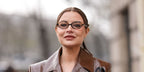 Italian fashion influencer Veronica Ferraro was seen wearing tortoiseshell Miu Miu MU 01XV VAU1O1 oval glasses at the Miu Miu Fall/Winter 2025 fashion show during Paris Fashion Week.