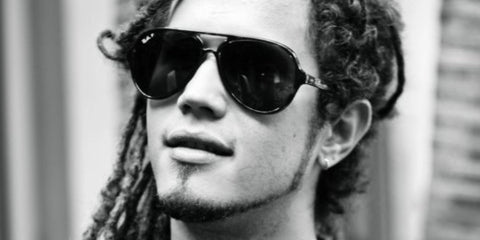 Dominican singer-songwriter Vicente Garcia was seen wearing black Ray-Ban RB 4376 601/71 sunglasses with polarised lenses. Shop online now on Pretavoir