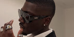 British-Zambian content creator Victor Kunda was seen wearing black Bottega Veneta BV1362S 001 sunglasses in his Instagram post, March 2025. Shop online now on Pretavoir