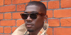 British-Zambian content creator Victor Kunda was seen wearing yellow tortoiseshell Burberry BE4426 4106/87 sunglasses in his Instagram post, September 2024. Shop online now on Pretavoir