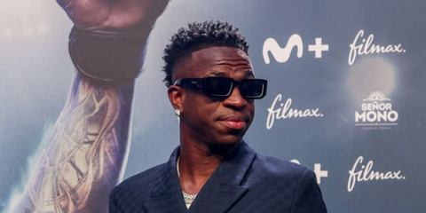 Brazilian footballer Vinicius Junior was seen wearing black and white Prada PR 06YS 09Q5S0 sunglasses at the Madrid premiere of documentary 'Topuria: Matador', September 2024. Shop online now on Pretavoir