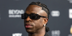 Brazilian footballer Vinicius Junior was seen wearing black Prada PR B03S 1AB5S0 sunglasses at the Globe Soccer Awards ceremony in Dubai, December 2024. Shop online now on Pretavoir