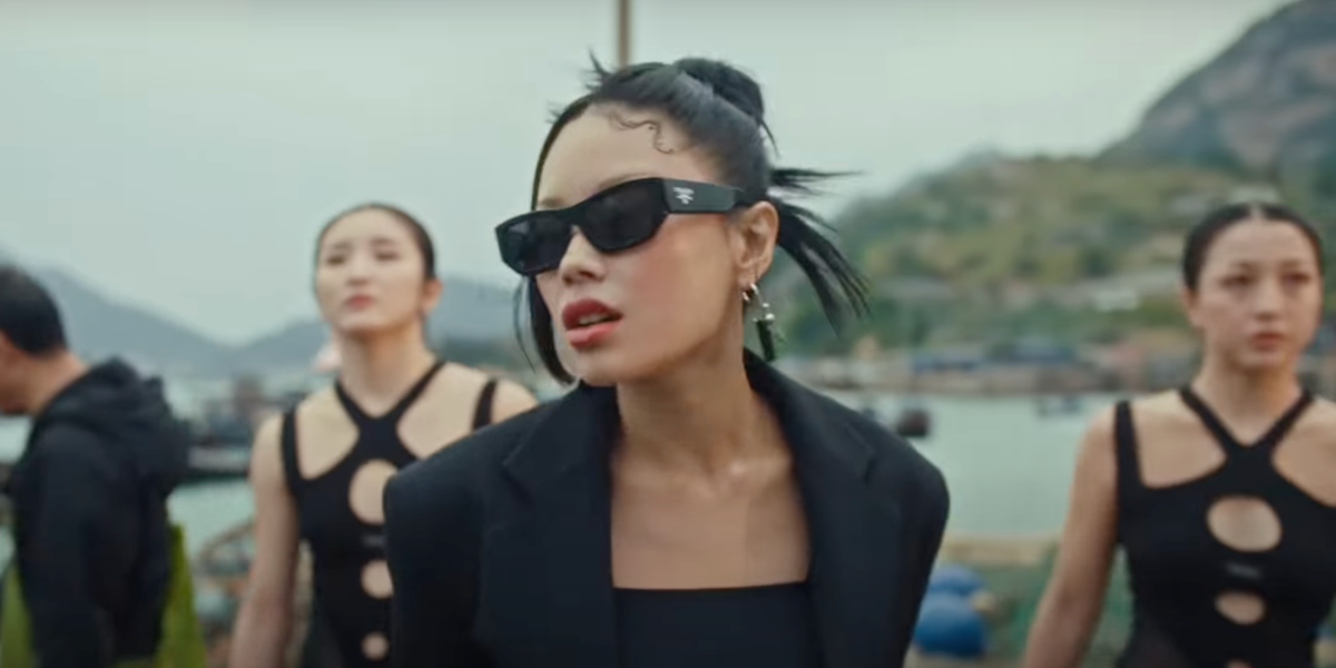 Vinida Weng was seen wearing black Prada PR A01S 16K08Z sunglasses in her 2023 music video "Waiya!". Shop online now on Pretavoir