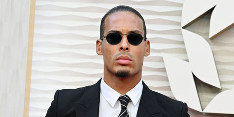 Dutch footballer Virgil van Dijk was seen wearing black Saint Laurent SL 799 001 round sunglasses at the PFA Awards 2025 in Manchester. Shop online now on Pretavoir