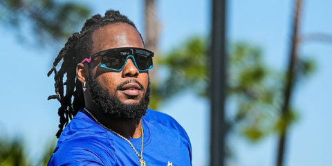 Baseball athlete Vladimir Guerrero Jr. was seen wearing tricolour black, turquoise, and pink Oakley BXTR OO9280 05 Prizm sunglasses in his Instagram post, March 2024