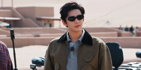 Chinese actor Wang Anyu is seen wearing Bottega Veneta BV1191S 001 sunglasses while on a shooting set