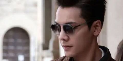 Hong Kong singer William Chan was seen wearing grey Zegna Orizzonte I EZ0231 20B sunglasses in August 2025.