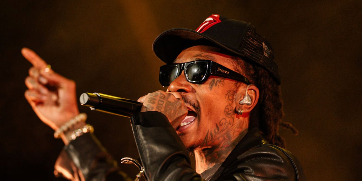 Wiz Khalifa was seen wearing black Saint Laurent Sun SL 740 005 sunglasses onstage at the 420 Eve On The Rocks in Colorado April 2026.