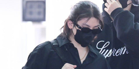 Woozi of K-Pop group SEVENTEEN was seen wearing black Prada PR 26ZS 16K08Z sunglasses. Shop online now on Pretavoir