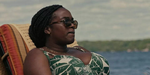 Actress Wunmi Mosaku was seen wearing yellow tortoiseshell Persol 3092SM 9005/51 round sunglasses in 2022 thriller movie Alice, Darling.