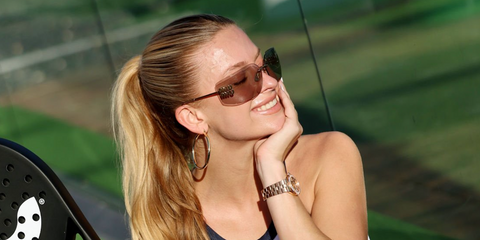 DJ and musical artist Xandra Pohl was seen wearing gold Miu Miu Rimless Runway MU 54YS ZVN20F sunglasses with light brown lenses at the CELSIUS Padel Classic 2024 in Miami.