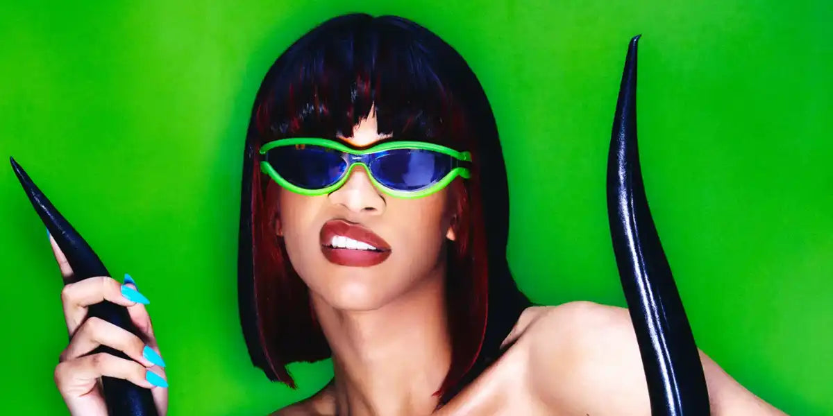 Yasmin Finney was seen wearing green Bottega Veneta BV1211S 001 sunglasses in a British GQ feature